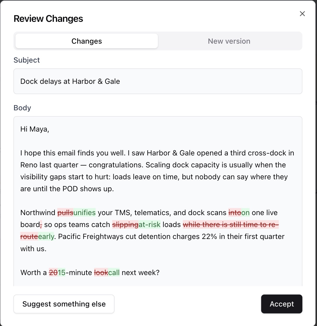 The Review Changes dialog showing the revised email with insertions and deletions highlighted inline
